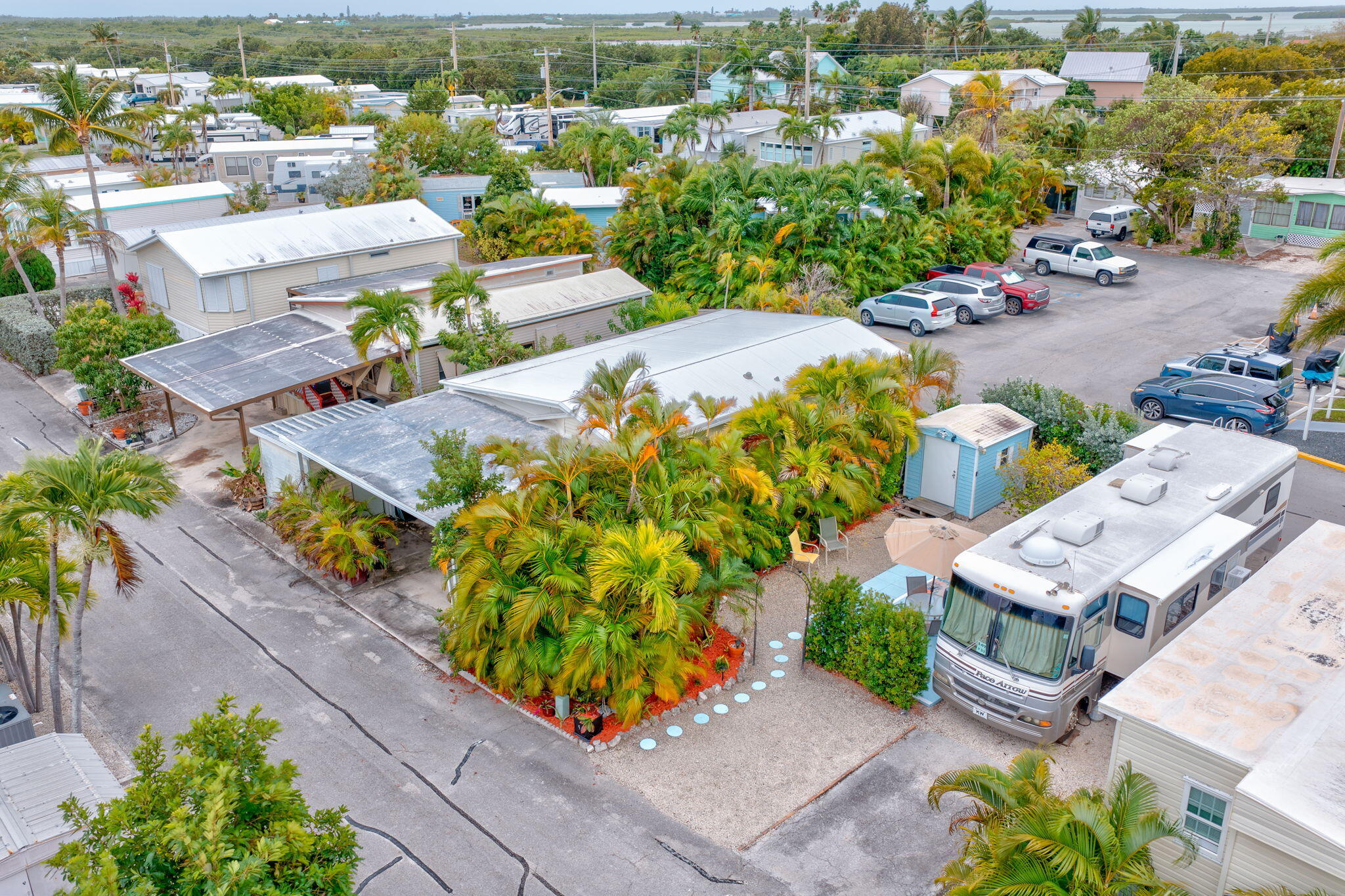 55 Boca Chica Road, Unit 53 Key West, FL 33040 - Photo 15 of 35 an aerial view of a house with a yard basket ball court and outdoor seating