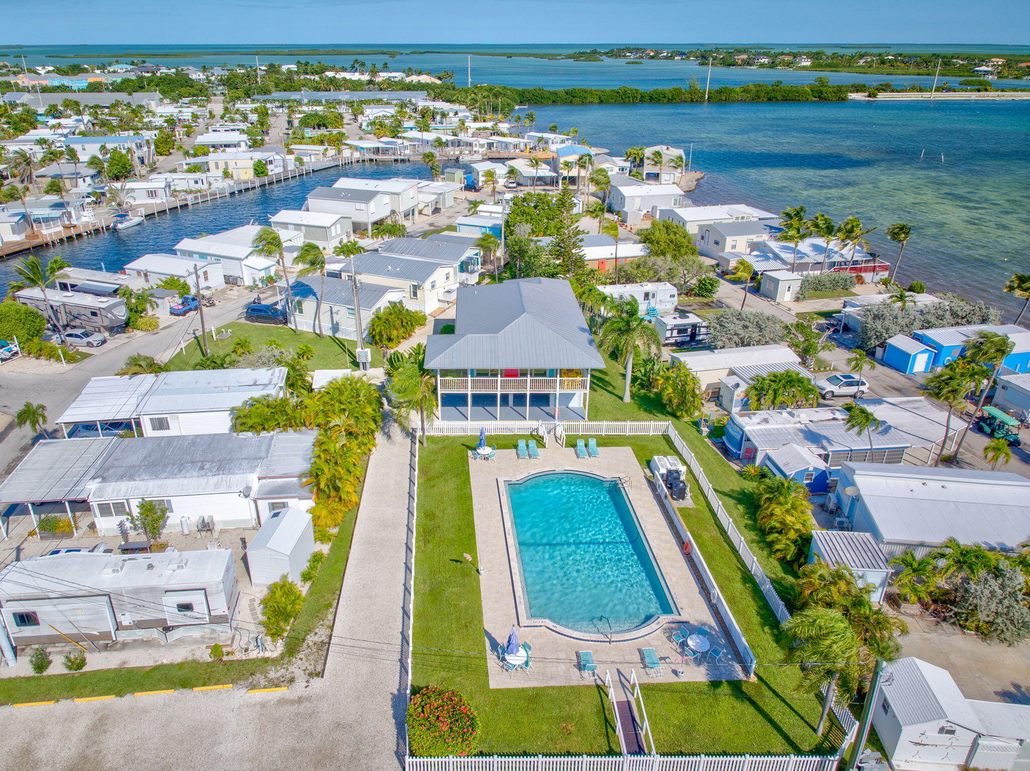 55 Boca Chica Road, Unit 53 Key West, FL 33040 - Photo 20 of 35 an aerial view of residential houses with outdoor space and swimming pool