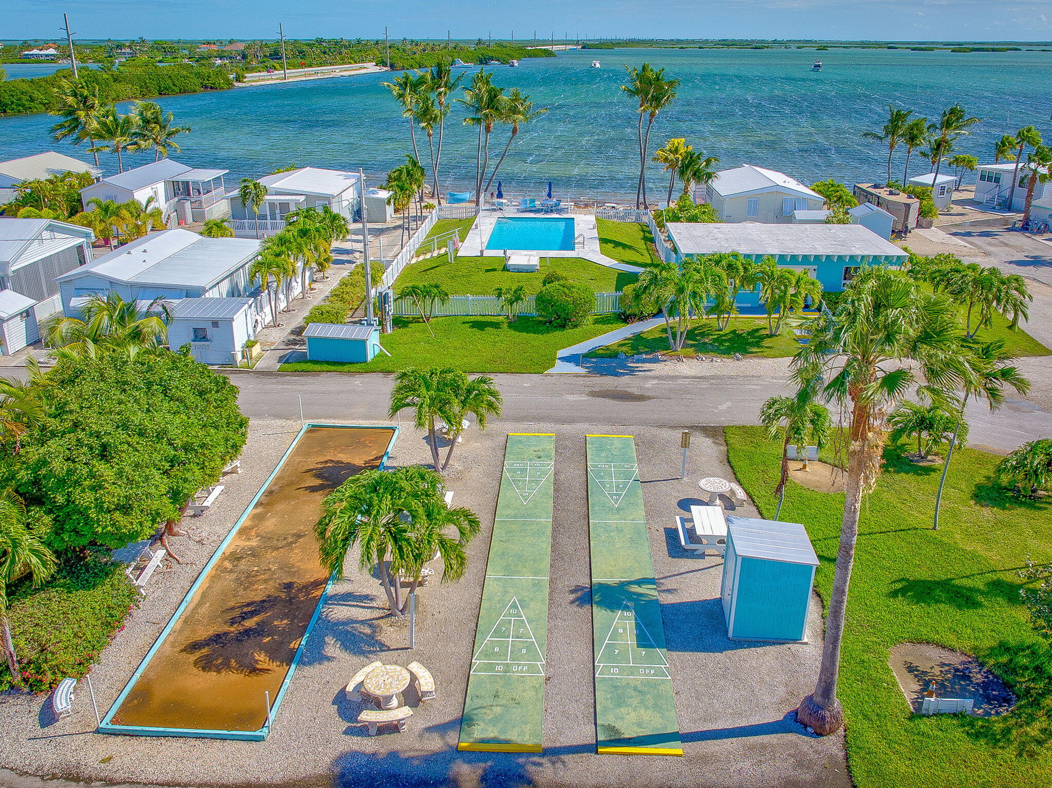 55 Boca Chica Road, Unit 53 Key West, FL 33040 - Photo 21 of 35 an aerial view of a house with a yard basket ball court and outdoor seating