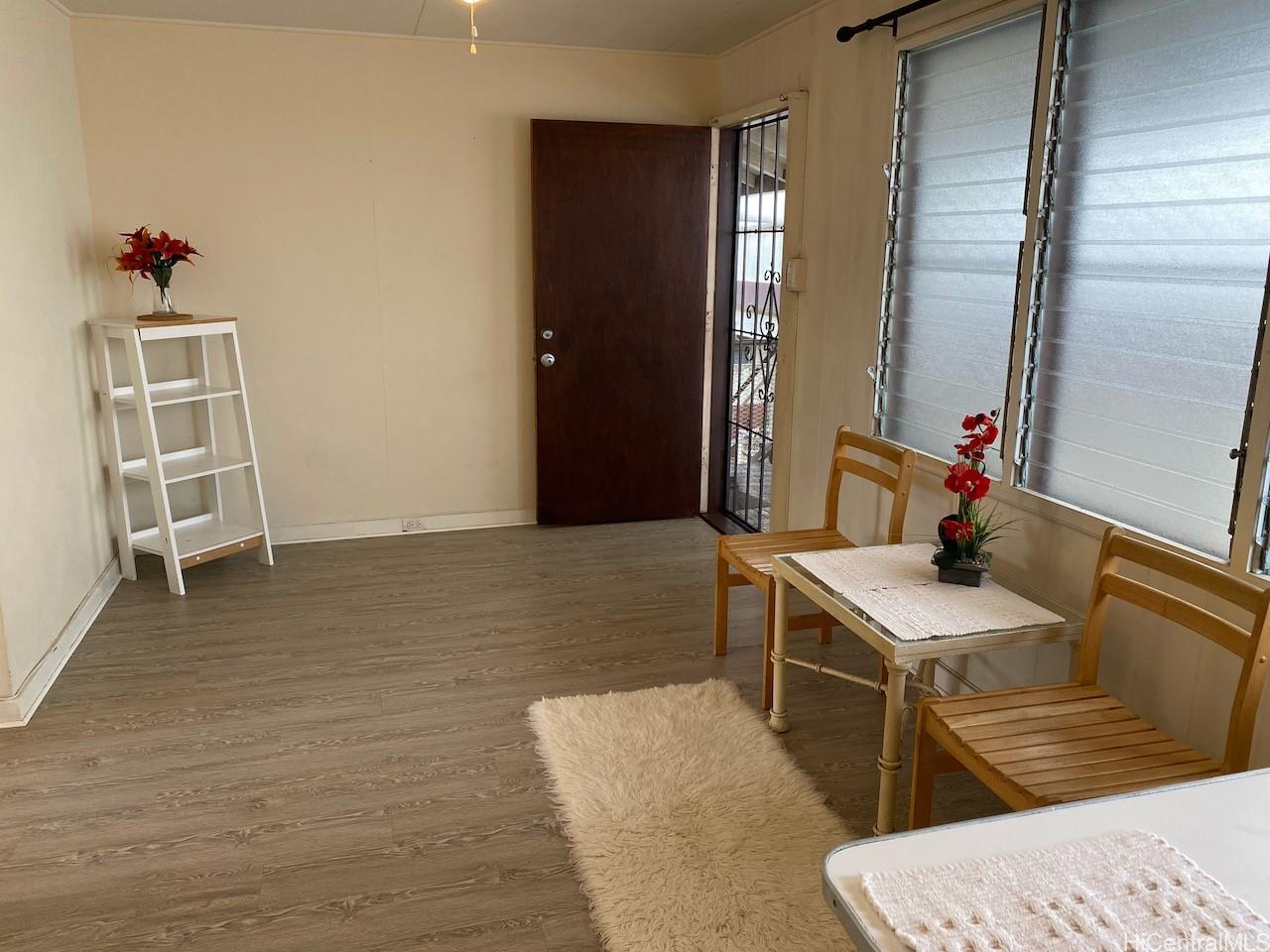2810 Winam Avenue, Unit B Honolulu, HI 96816 - Photo 1 of 15 a bath room with a sink and a mirror