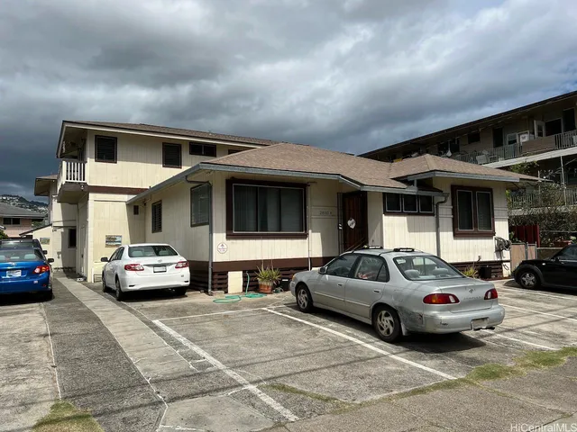 a car parked in front of a house