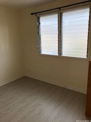 a view of a window in an empty room