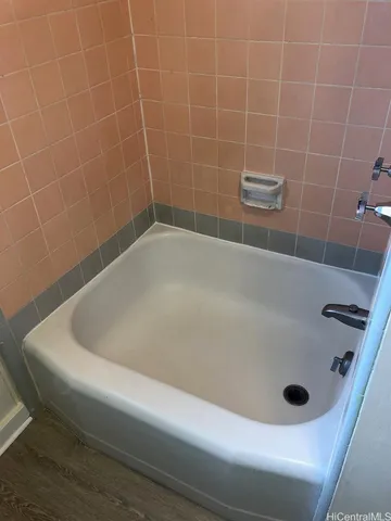 a bathroom with a bathtub