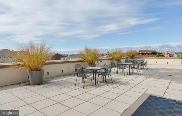 a view of a terrace with furniture