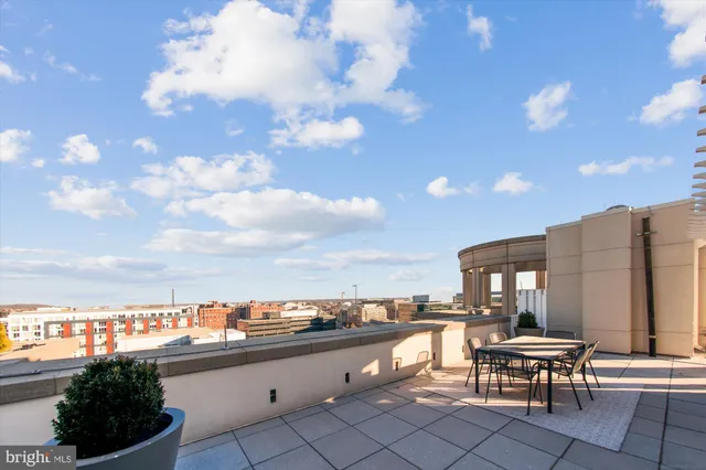a view of a terrace with furniture and stove