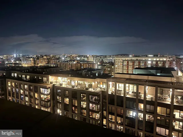 a view of parking garage with cars