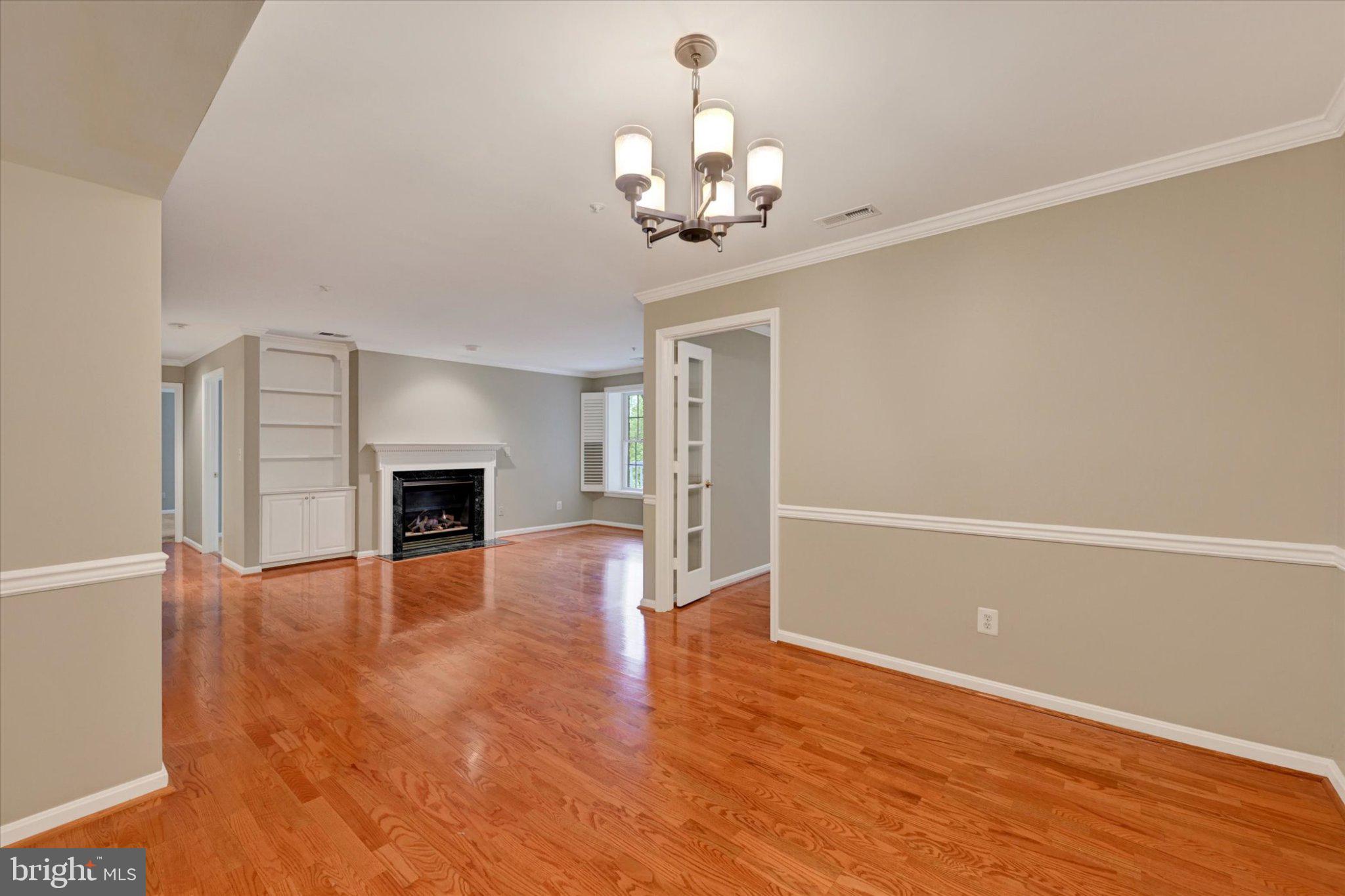 12310 Rosslare Ridge Road, Unit 405 Lutherville-Timonium, MD 21093 - Photo 10 of 36 Spacious living area with elegant charm.