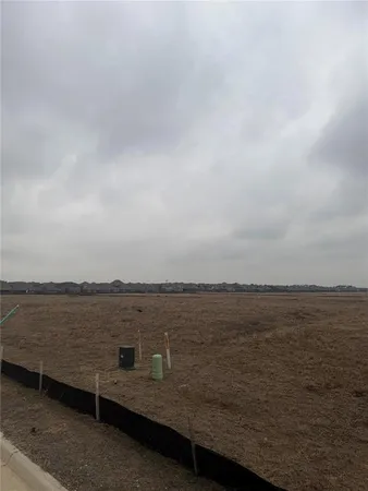 a view of a lake next to a beach