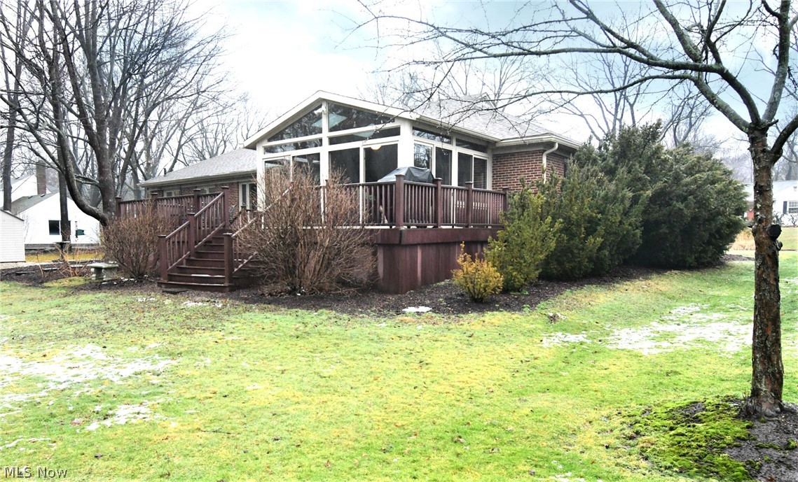 404 Somerset Road Akron, OH 44313 - Photo 25 of 25 Another rear view of Sun Room, wrap around deck and side of property