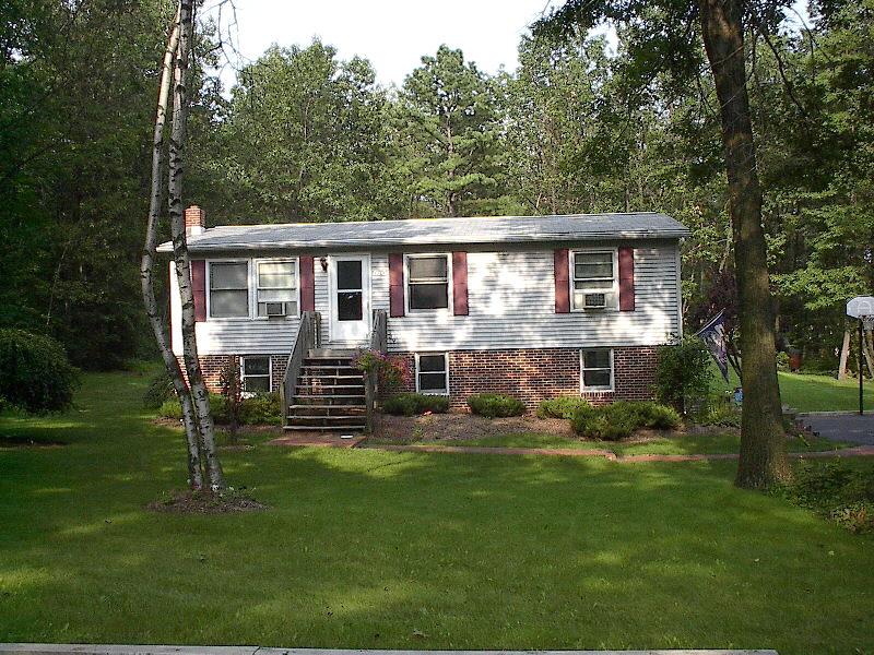 1701 Valley Road Effort, PA 18330 - Photo 1 of 1 a front view of a house with a garden