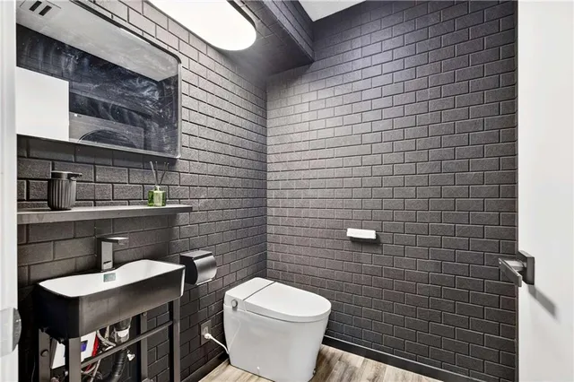 a bathroom with a sink and a toilet