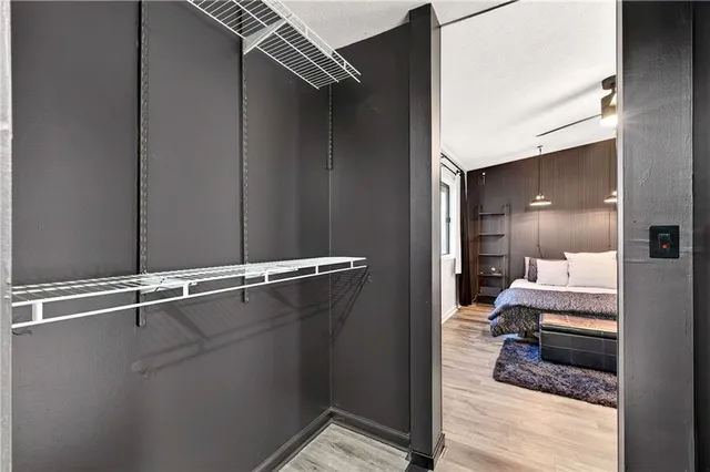 a view of a hallway with a room