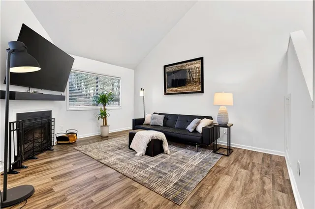 a bedroom with furniture or couch and a fireplace