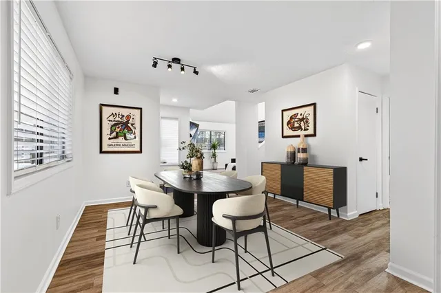 a view of a dining room with furniture