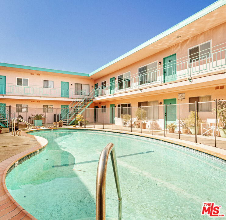 7825 West Manchester Avenue, Unit 10 Playa del Rey, CA 90293 - Photo 12 of 15 a view of a house with swimming pool and sitting area