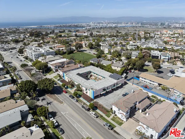 an aerial view of a city with lots of residential buildings