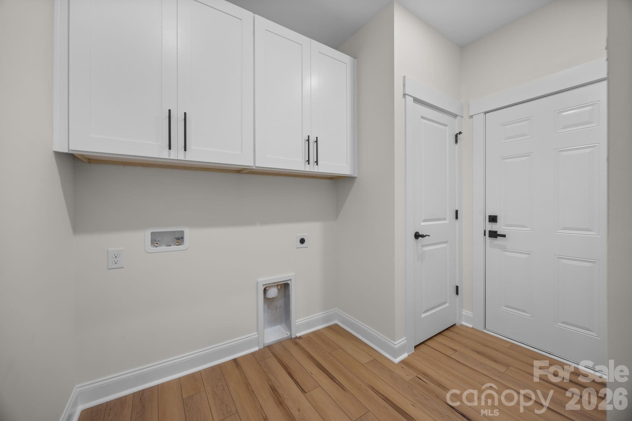 635 Fiber Acres A Street Cleveland, NC 27013 - Photo 24 of 42 a view of kitchen with wooden floor and cabinets