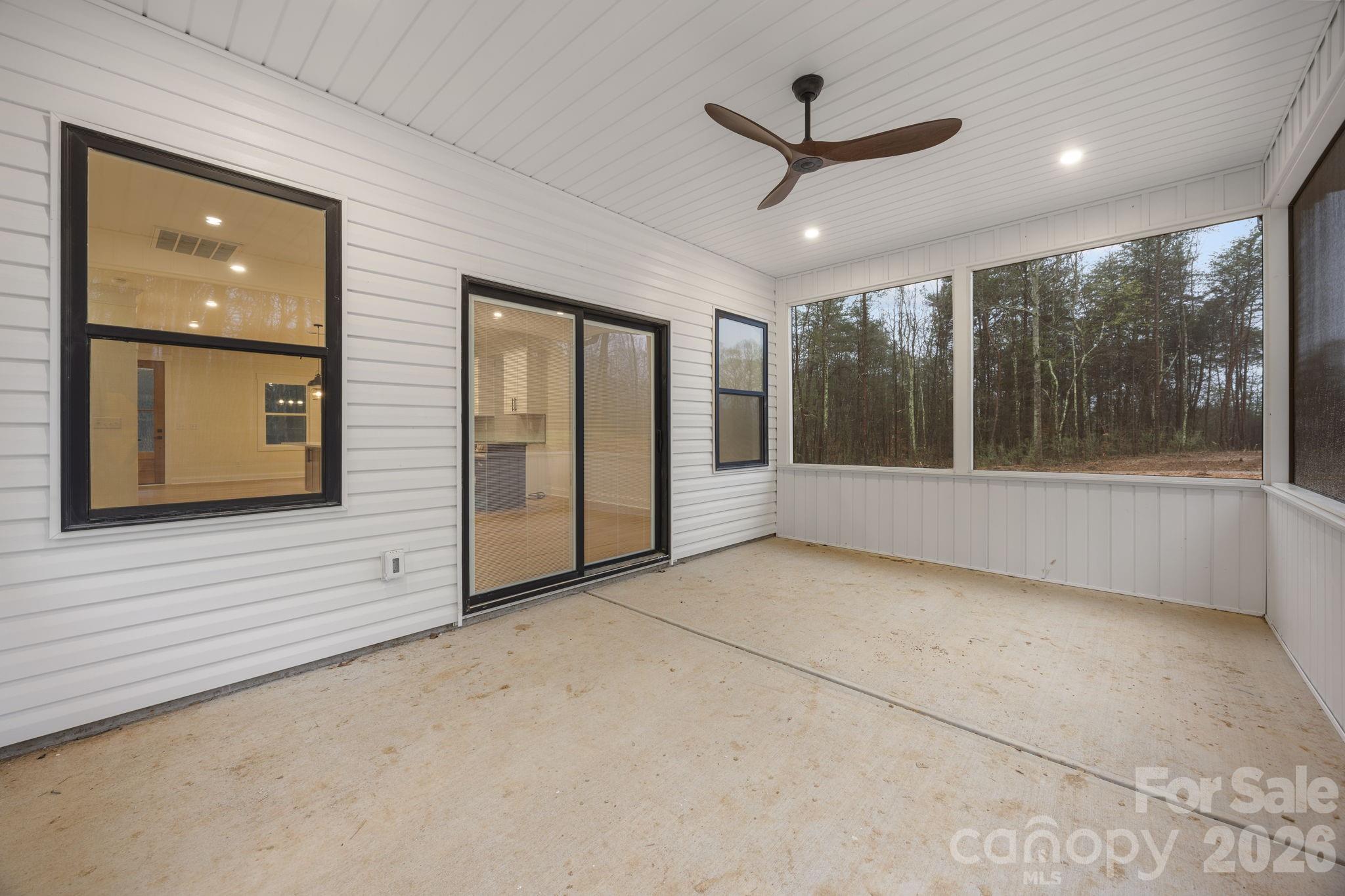 635 Fiber Acres A Street Cleveland, NC 27013 - Photo 28 of 42 a view of a livingroom with a ceiling fan and window