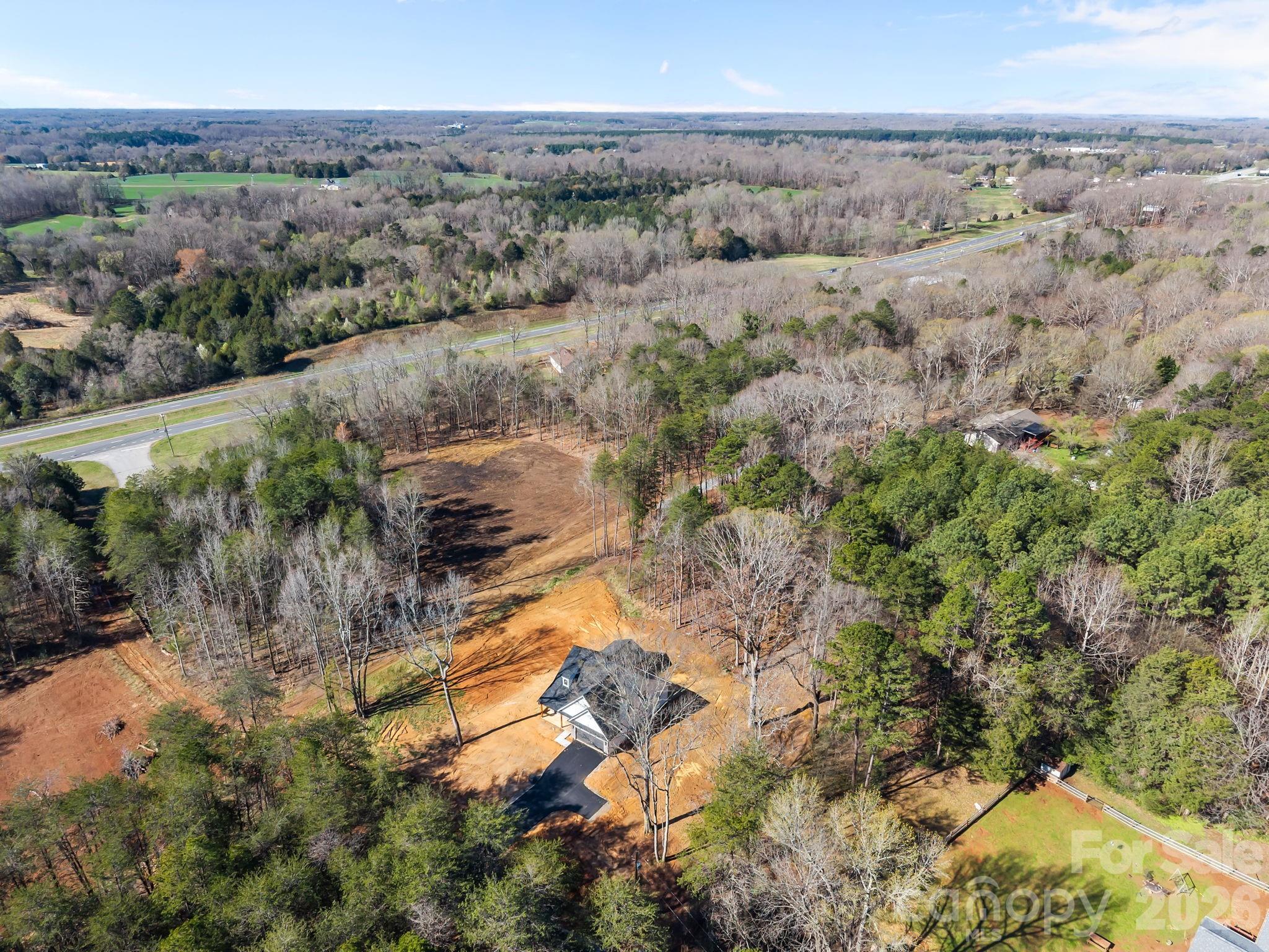 635 Fiber Acres A Street Cleveland, NC 27013 - Photo 41 of 42 an aerial view of mountain with trees