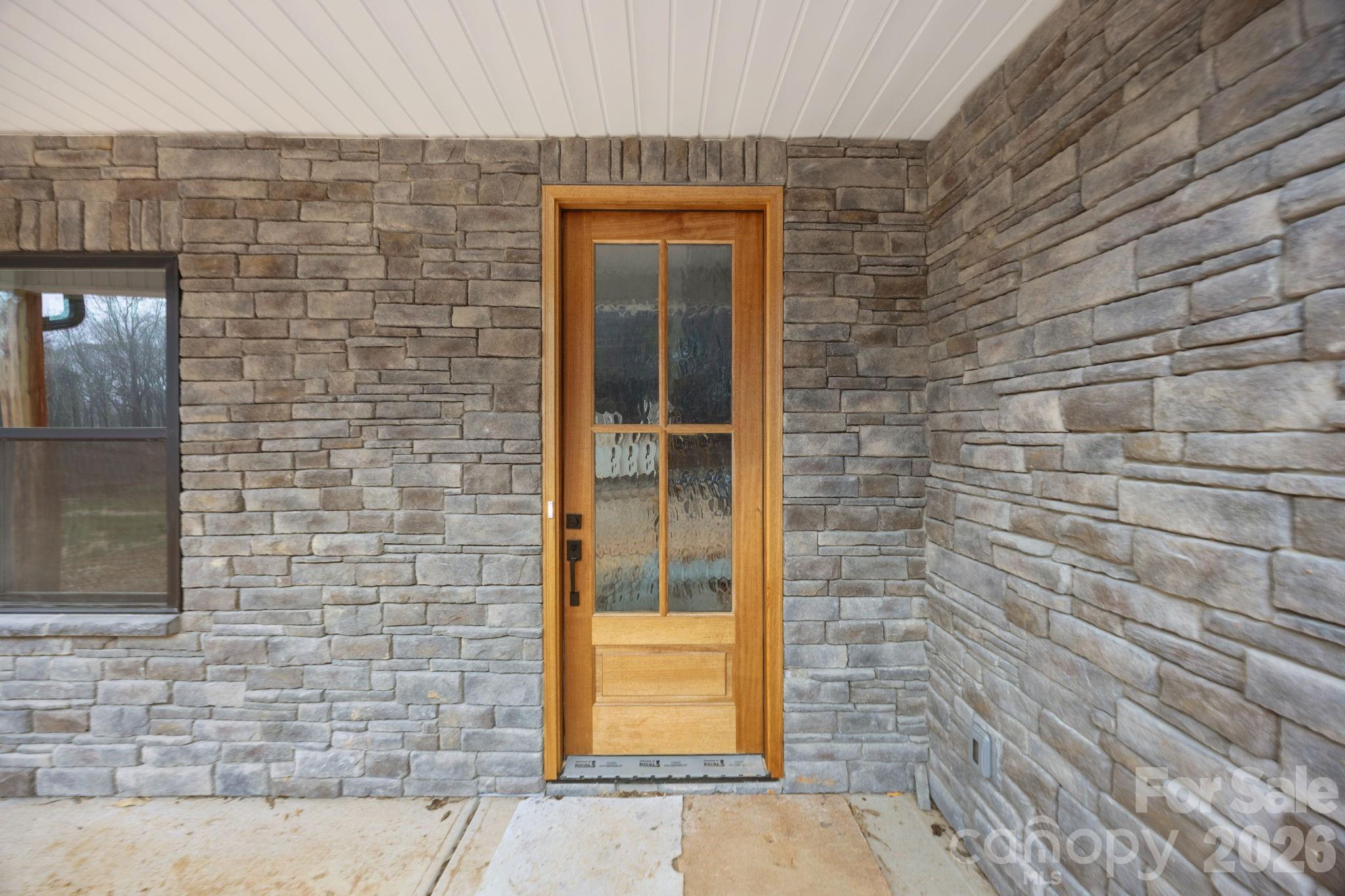 635 Fiber Acres A Street Cleveland, NC 27013 - Photo 6 of 42 a brick house with a door