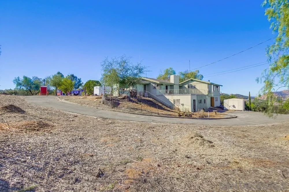 1735 Foss Road Alpine, CA 91901 - Photo 8 of 69 a view of a house with a yard and plant