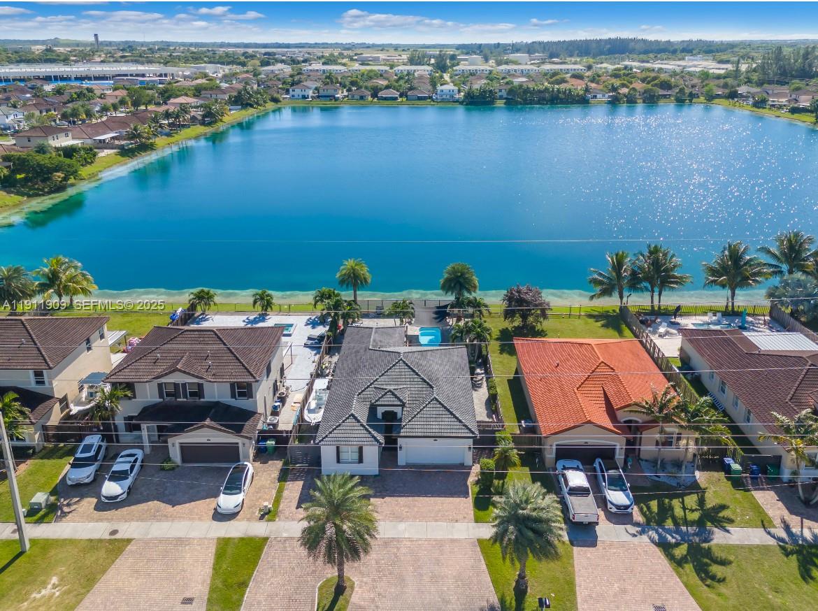 13000 Southwest 280th Street Homestead, FL 33033 - Photo 12 of 28 an aerial view of a house with a lake view