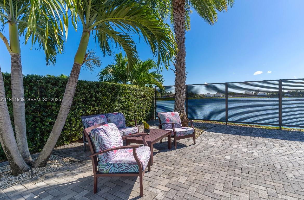 13000 Southwest 280th Street Homestead, FL 33033 - Photo 15 of 28 a view of a chair and tables in the patio