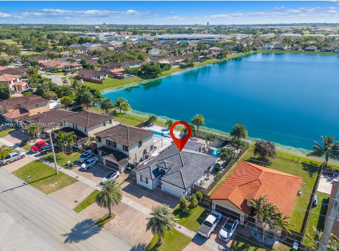 13000 Southwest 280th Street Homestead, FL 33033 - Photo 22 of 28 an aerial view of a houses with a lake