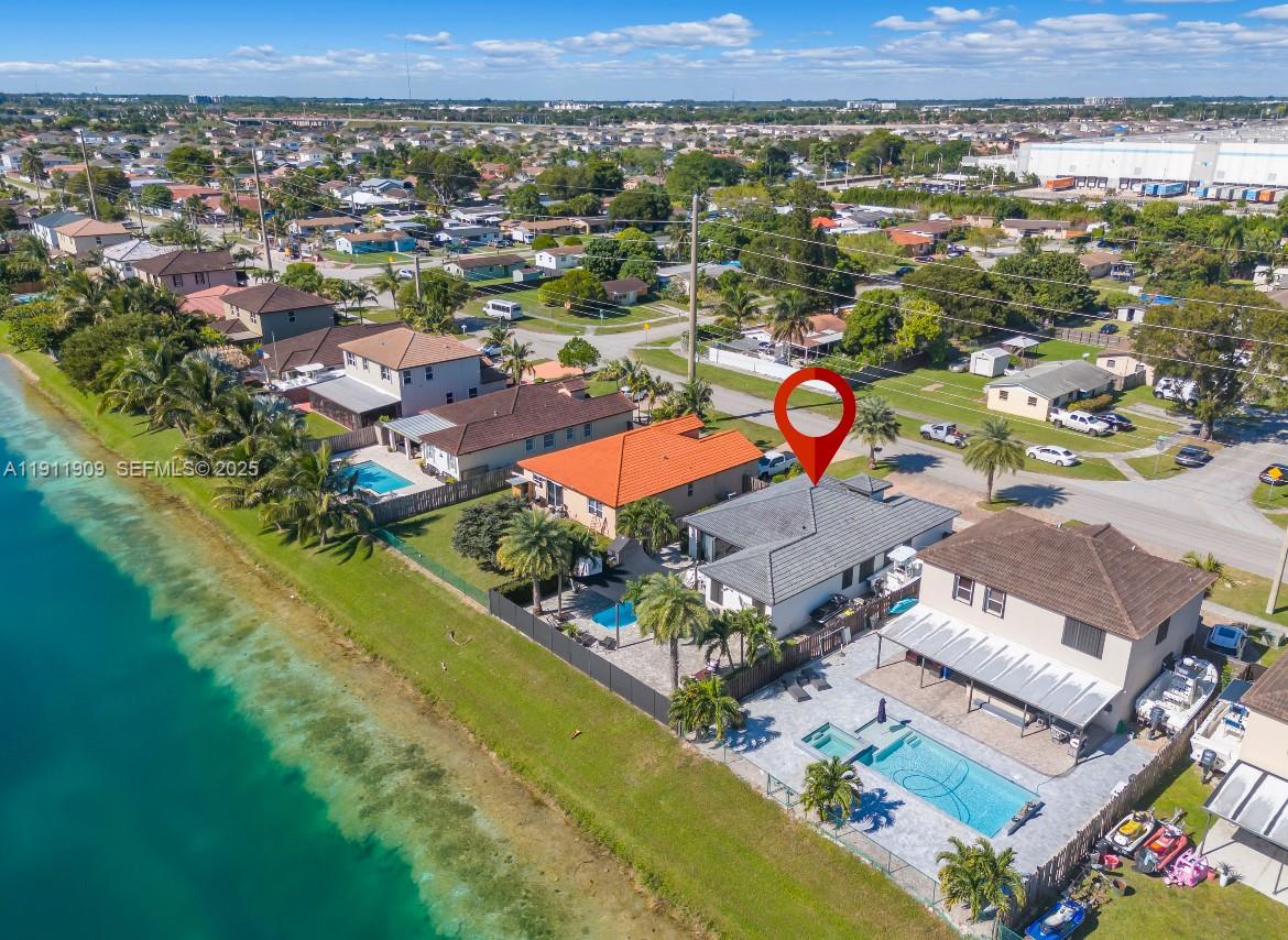 13000 Southwest 280th Street Homestead, FL 33033 - Photo 26 of 28 an aerial view of residential houses with outdoor space