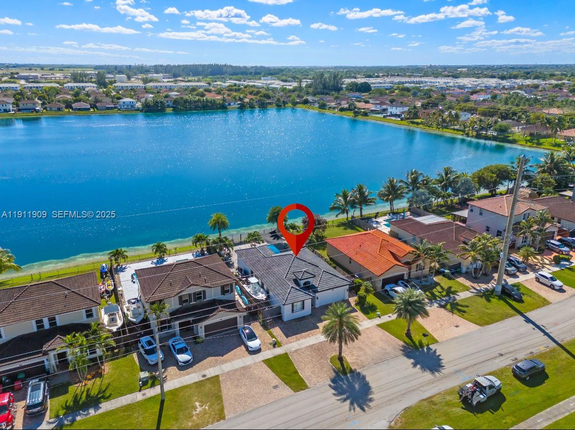 13000 Southwest 280th Street Homestead, FL 33033 - Photo 3 of 28 an aerial view of a houses with outdoor space