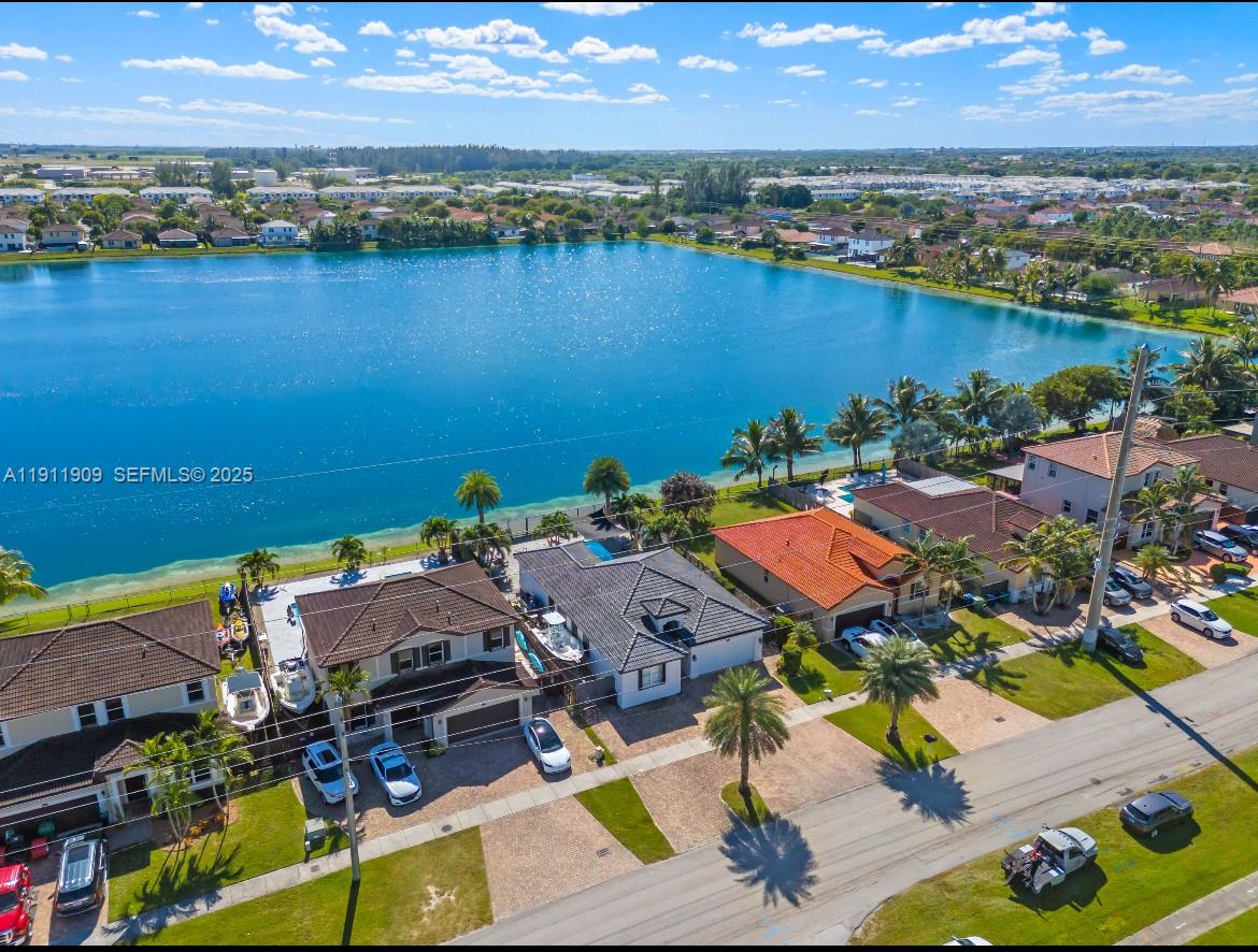 13000 Southwest 280th Street Homestead, FL 33033 - Photo 4 of 28 an aerial view of residential houses with outdoor space and ocean view