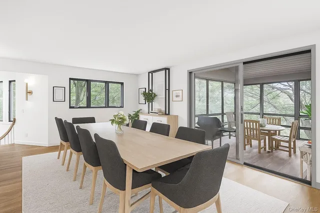a dining room with furniture and a fireplace