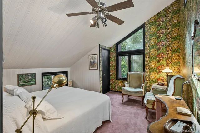 a view of a balcony with chair and wooden floor