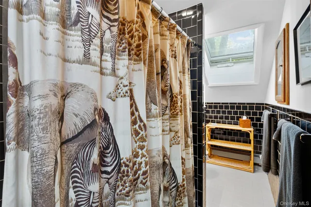 a view of a chairs and table in the balcony