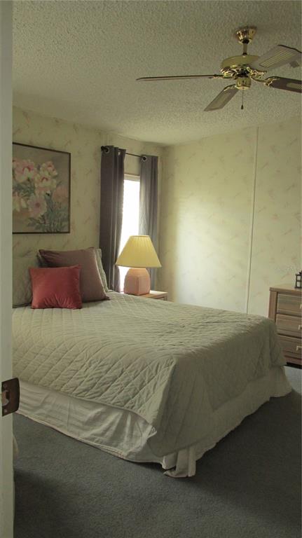 261 Ramsgate Way Haines City, FL 33844 - Photo 20 of 28 a bedroom with a bed and window