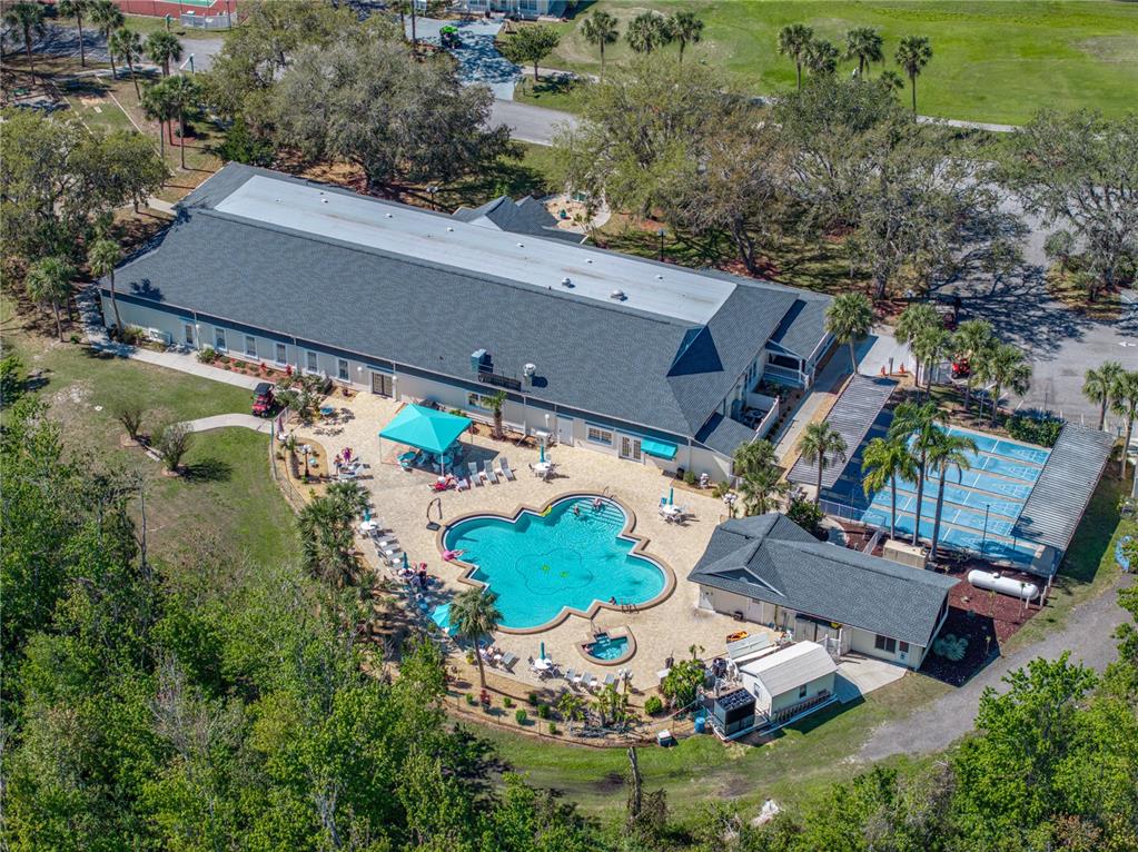 261 Ramsgate Way Haines City, FL 33844 - Photo 25 of 28 an aerial view of a house with a garden and trees