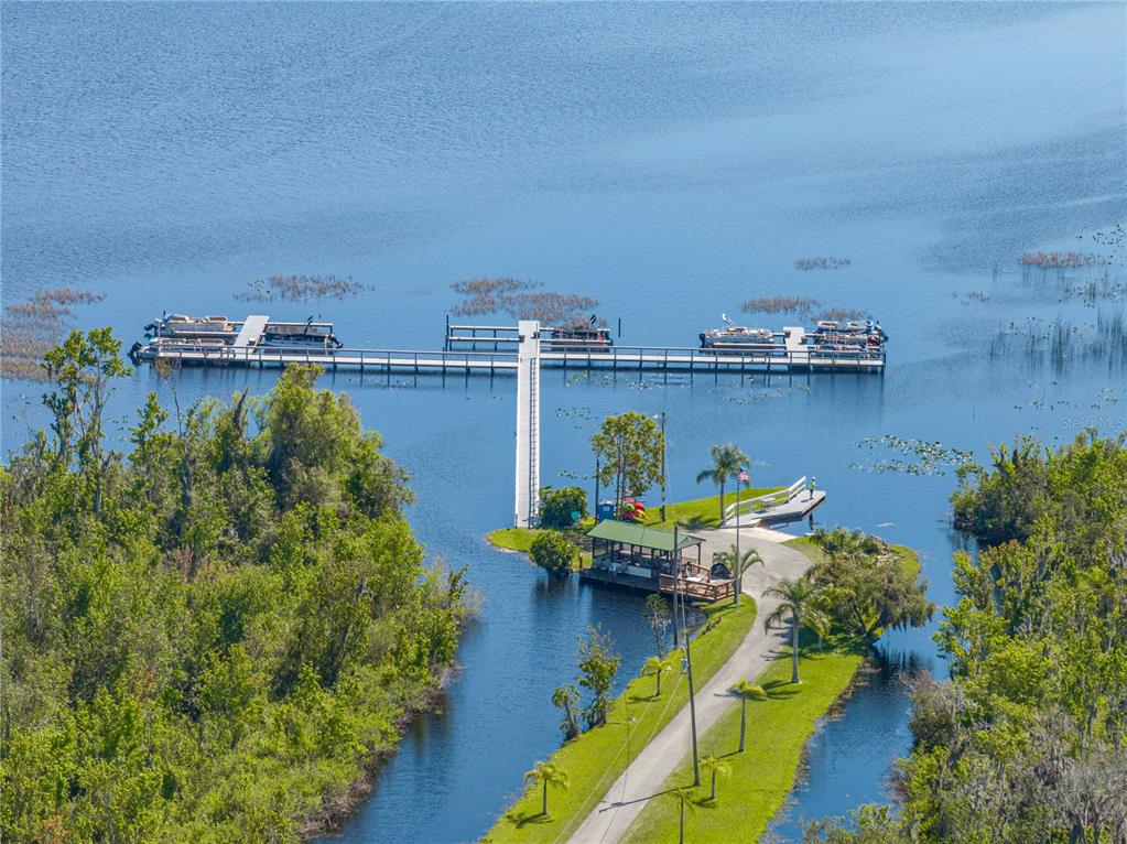 261 Ramsgate Way Haines City, FL 33844 - Photo 26 of 28 an aerial view of a house with outdoor space swimming pool and lake view