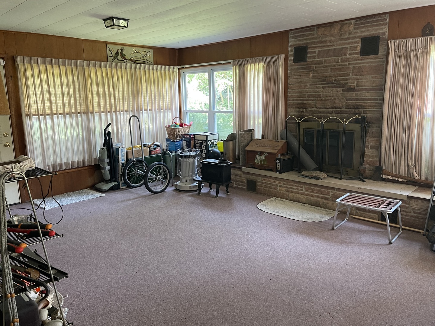 308 High Street Putnam, IL 61560 - Photo 11 of 21 a living room with furniture and a fireplace