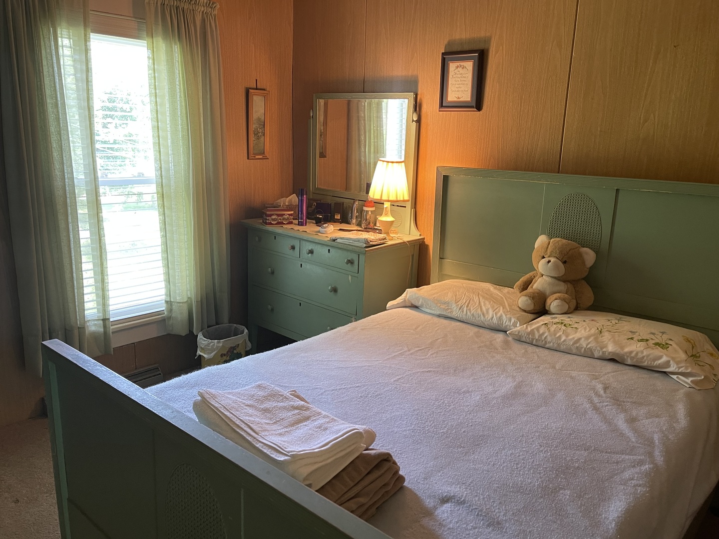 308 High Street Putnam, IL 61560 - Photo 4 of 21 a bedroom with a bed and a window