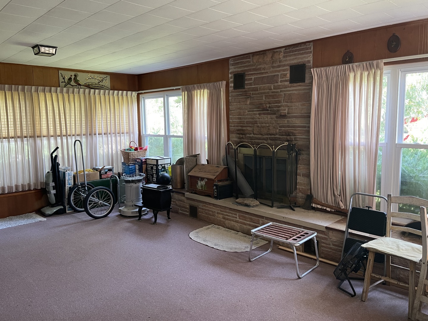 308 High Street Putnam, IL 61560 - Photo 9 of 21 a living room with furniture a fireplace and large window