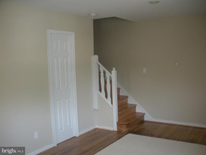 12008 Bluhill Road Silver Spring, MD 20902 - Photo 1 of 5 a view of staircase with wooden floor