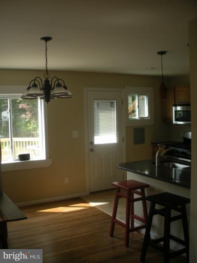 12008 Bluhill Road Silver Spring, MD 20902 - Photo 4 of 5 a dining room with furniture and window