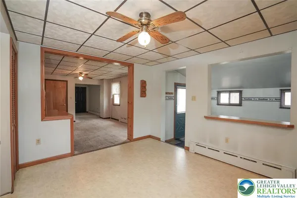 a view of a hallway with a chandelier