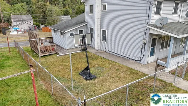 a aerial view of a house with a swimming pool