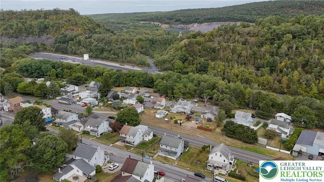 an aerial view of a city with lots of residential buildings