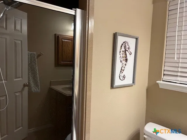 a bathroom with a mirror