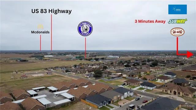 a view of a street with an ocean view
