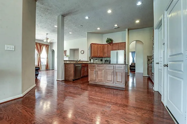 a view of kitchen with cabinets and stainless steel appliances