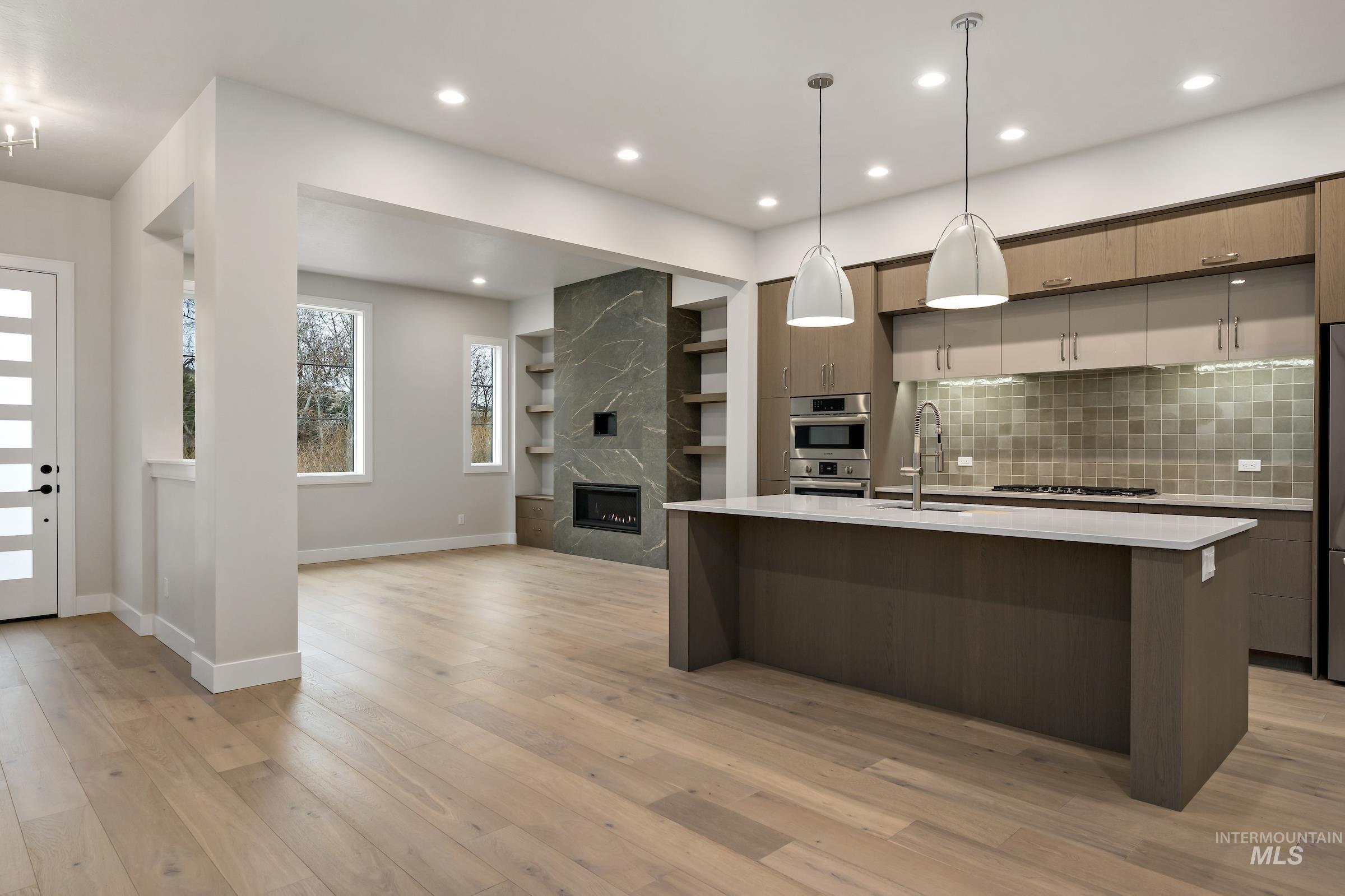 3390 West Neville Rnch Drive Boise, ID 83714 - Photo 16 of 29 Bright interior space featuring a large picture window and an additional vertical window