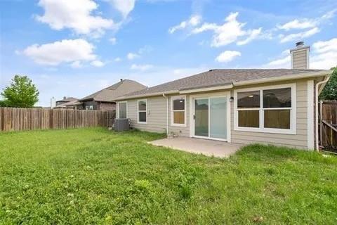 1404 Swan Ridge Drive Sherman, TX 75092 - Photo 15 of 16 a view of a house with a yard and sitting area